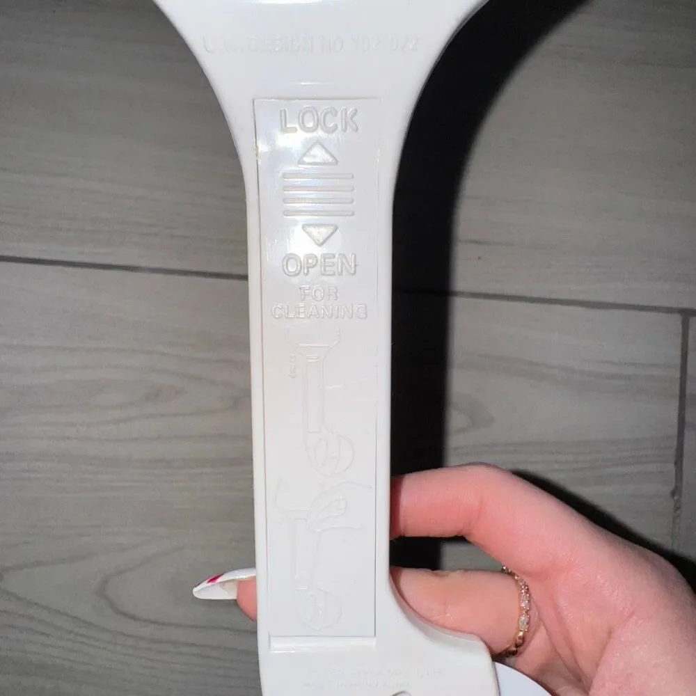 Vintage pizza cutter, cake cutter. Has a switch to push slice off and can be tak